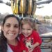 Mom and child in front of the Rocket ride at Disneyland