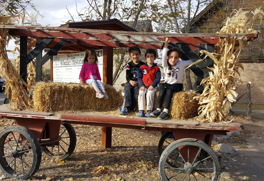 children on farm wagon